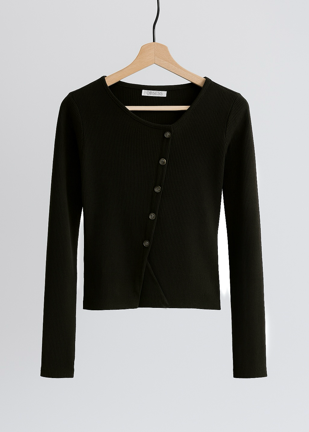 Ribbed vest with asymmetrical buttoning